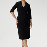 Crafted from our signature dry-touch stretch jersey fabric, the Jett Dress is a sophisticated wrap dress, tailored for a corporate or event setting and featuring a modern angular collar detail adds an edgy look to your work wear style. Available in Size 8-24 and Proudly Made in Australia.