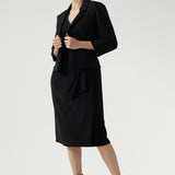 Featuring a sharp, interlined angular collar and ¾ length sleeves, the Jett Dress brings an edgy twist to classic corporate fashion, making it a standout piece in any professional wardrobe.
