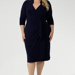 Designed with signature dry-touch stretch jersey fabric, the Jett Dress is a wrap dress, tailored for a corporate or event setting and featuring a modern angular collar. Available in Size 8-24 and Proudly Made in Australia.