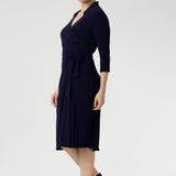 Women's wrap dress, tailored for a corporate or event settings and featuring a modern angular collar. Sizes 8-24 and Proudly Made in Australia.