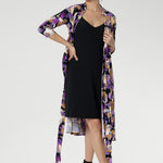 For added coverage or a smooth layered finish, style it with the Myah Slip underneath—perfect for achieving a sleek silhouette, especially in the office or at more formal events. Thoughtful design features like the interlined collar, double-layer back bodice, ¾ sleeves, and knee-length skirt ensure a polished, all-day look. 