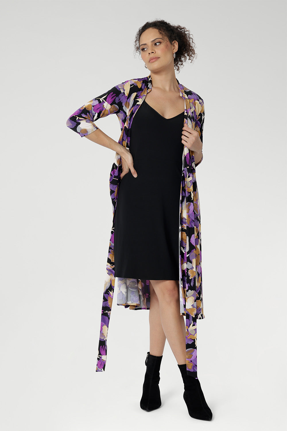 For added coverage or a smooth layered finish, style it with the Myah Slip underneath—perfect for achieving a sleek silhouette, especially in the office or at more formal events. Thoughtful design features like the interlined collar, double-layer back bodice, ¾ sleeves, and knee-length skirt ensure a polished, all-day look. 
