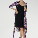 For added coverage or a smooth layered finish, style it with the Myah Slip underneath—perfect for achieving a sleek silhouette, especially in the office or at more formal events. Thoughtful design features like the interlined collar, double-layer back bodice, ¾ sleeves, and knee-length skirt ensure a polished, all-day look. 