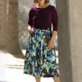 Effortlessly stylish and endlessly wearable, the Joanie Dress in Scandi Abstract is your go-to piece for comfort, confidence, and flair. Blending a soft, dry-touch stretch jersey bodice in rich plum with a flowing Italian Viscose skirt, this dress delivers the perfect balance of structure and movement.