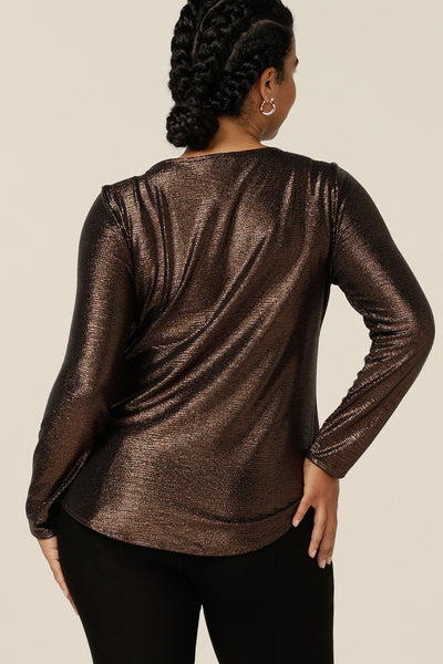 Back view of a sparkly occasionwear top by Australian and New Zealand women's clothing brand, L&F. With a high scoop neck and long sleeves, this shimmering stretch jersey top in Mocha brown is comfortable and modest top for women from petite to plus sizes and great too, for 40 plus women looking for stylish occasionwear.
