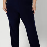 Size 18 model wears navy pants crafted from soft-touch jersey fabric, these pants are lightweight and incredibly comfortable. Leina & Fleur, an Australian clothing brand stocks these pants in size 8-24, ensuring a tailored fit for all, whether you're at the office or on the go.