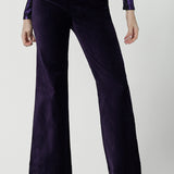 Close up of a Jonas pant in Purple Velveteen is a kick flare pant made in purple velveteen fabric. Cocktail pant suit sets. Made in Australia for women size 8 - 24.