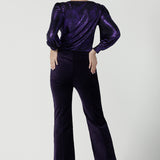 Back view of the Jonas pant in Purple Velveteen is a kick flare pant made in purple velveteen fabric. Cocktail pant suit sets. Made in Australia for women size 8 - 24.