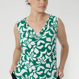 Designed to pair seamlessly with the L+F Soft Suiting Collection, it features a draped cowl neckline and a relaxed yet refined silhouette that flatters every shape.