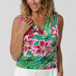 This floral sleeveless top is the ultimate choice for summer events, combining style, comfort, and versatility. Featuring a flattering cowl neckline, it adds a touch of elegance and flow, while the cooling fabric ensures you stay comfortable. Crafted from floral printed slinky jersey, the fabric is soft, breathable, and drapes beautifully. The vibrant floral print adds a pop of colour, perfect for sunny gatherings or evenings out. Available in sizes 8-24.