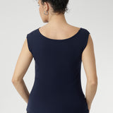This reversible design gives you two sophisticated looks in one—wear it with the asymmetrical cowl neckline and twisted shoulder detail at the front, or reverse it for a clean boat-neckline with soft draping at the back. Featuring a double-layer front and back for a smooth, flattering fit, the Jordan Top blends modern style with timeless versatility. Proudly designed and made in Australia.