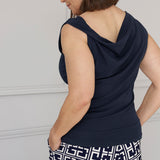 Reversible design gives you two sophisticated looks in one, wear it with the asymmetrical cowl neckline and twisted shoulder detail at the front, or reverse it for a clean boat-neckline with soft draping at the back. Available in sizes 8-24.