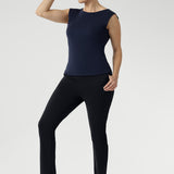Versatile and effortlessly elegant, the Jordan Top is crafted from our signature stretch fabric offering a soft, comfortable fit with a polished finish. Size 10 model wears her Jordan Top in Denim with high boat neck and charcoal coloured skinny leg pants and silver sneakers for a causal styled look. 