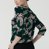 Back view of the Jules top in alpine is a green leaf printed top with a scoop neckline. Jersey top with 3/4 sleeves. Made in Australia for women size. 8 - 24.