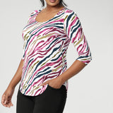 The vibrant Rainbow Zebra print, featuring shades of pink, taupe, and navy, adds a unique, eye-catching touch. Women's workwear top pairs beautiful with classic navy and black pants, skirts and jacket. Available in sizes 8-24.