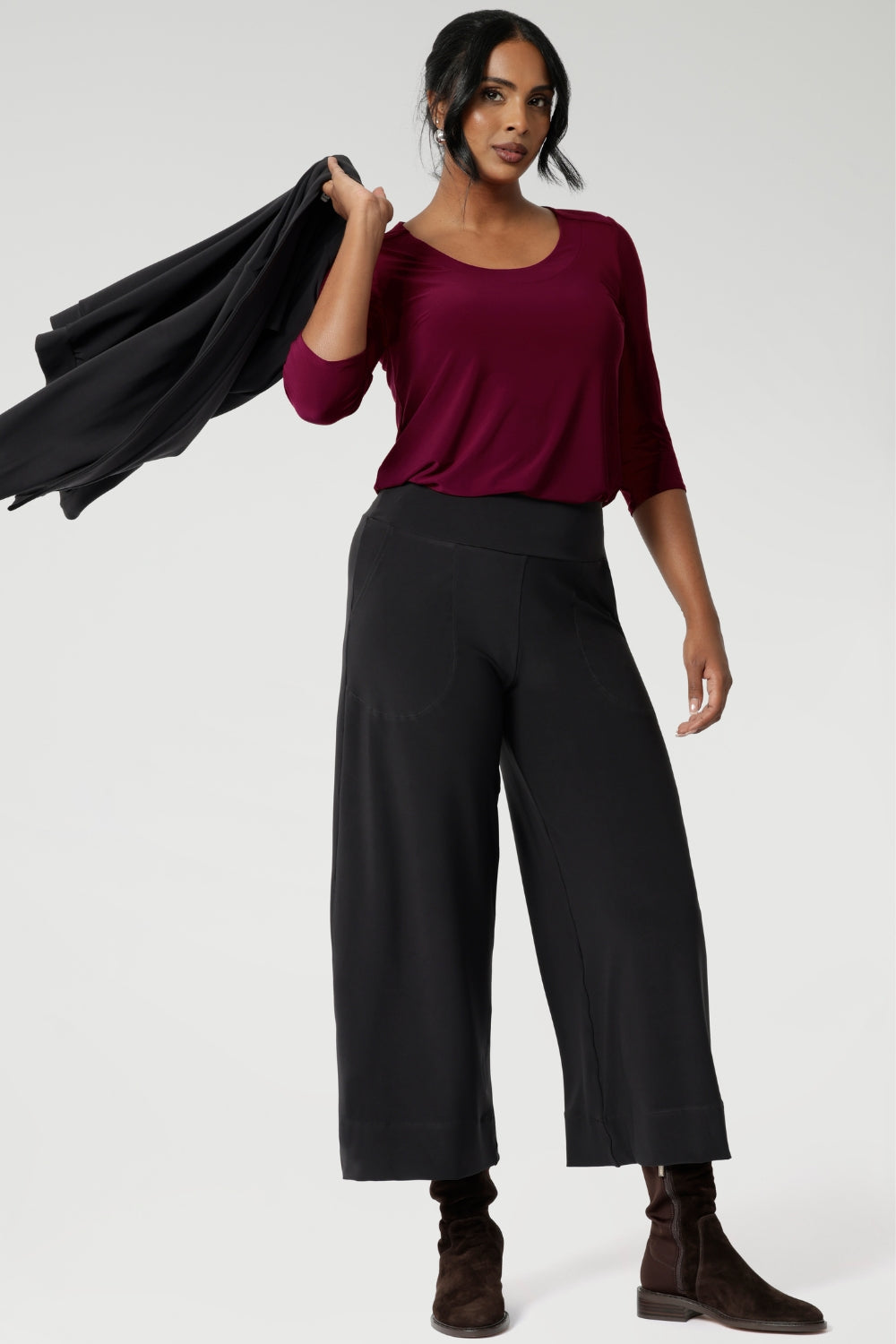 Make the transition from work to weekend effortlessly with the Jules Top. This stylish wardrobe essential features a scoop neckline and pairs beautifully under suiting jackets for a polished, elevated look.