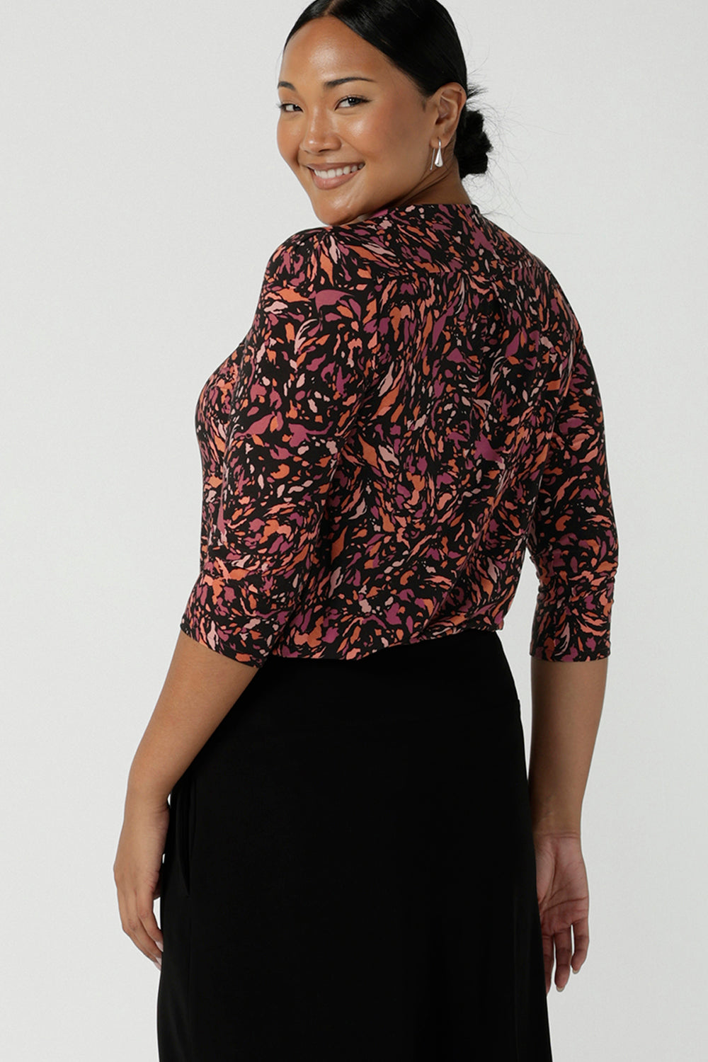 Back view of a size 10 woman wears the Jules Top in Terrazzo, a scoop neckline style with 3/4 sleeves. A comfortable easy care jersey style made in Australia for women size 8 - 24.