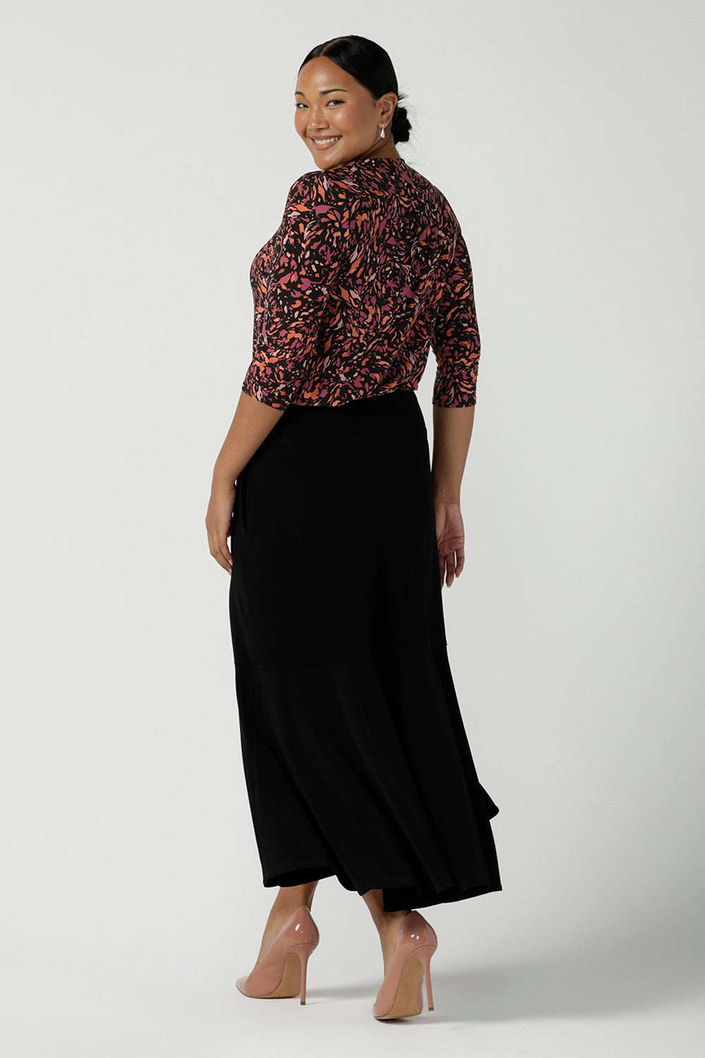 Back view of a size 10 woman wears the Jules Top in Terrazzo, a scoop neckline style with 3/4 sleeves. A comfortable easy care jersey style made in Australia for women size 8 - 24.