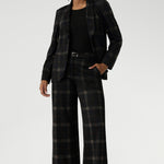 The Kade Pant brings timeless elegance with a contemporary twist, featuring a high-rise fit and full-length, wide-leg cut that flatters and elongates. A tailored waistband with a fly front and hook-and-bar closure offers a smooth, secure fit, while belt loops, back darts, and side front pockets add classic suiting details with a modern edge.
