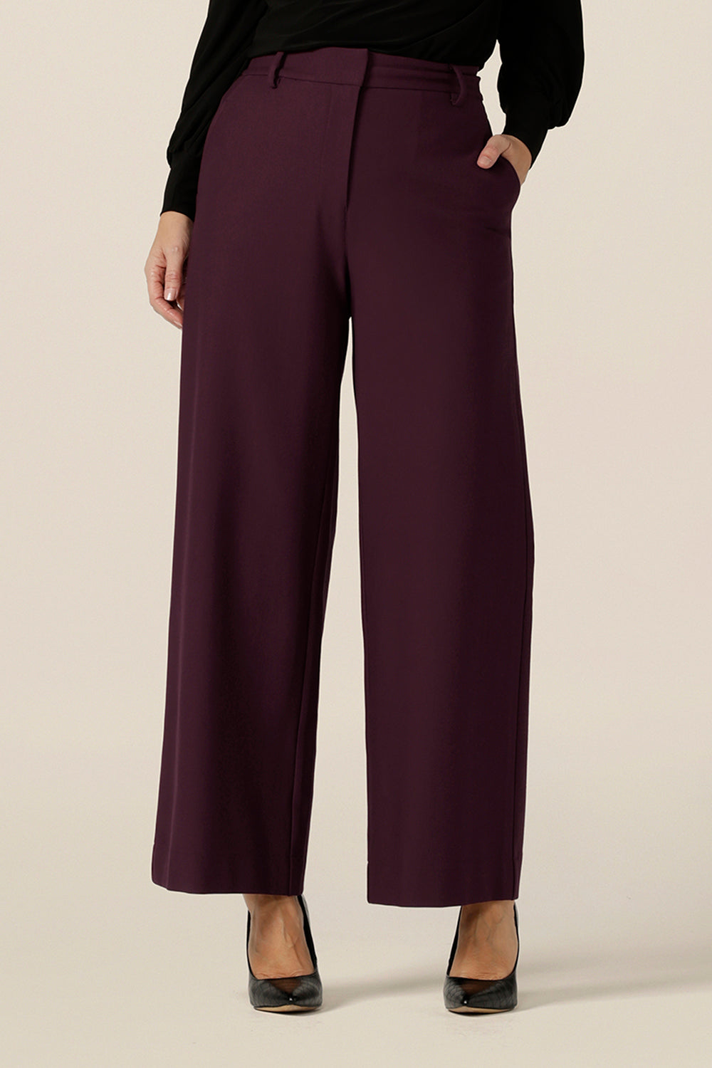 Great workwear pants, these wide leg, tailored trousers in Mulberry are shown in a size 10 and are styled for easy office wear.  Australian made by Australian and New Zealand women's pants experts,L&F, these easy-care pants are comfortable for work and corporate wear.