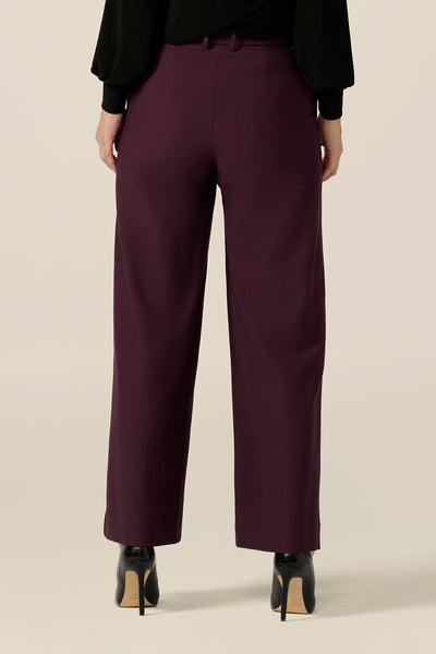 Back view of well-fitting workwear pants, these wide leg, tailored trousers in Mulberry are shown in a size 10 and are styled for easy office wear. Australian made by Australian and New Zealand women's pants experts,L&F, these easy-care pants are comfortable for work and corporate wear.