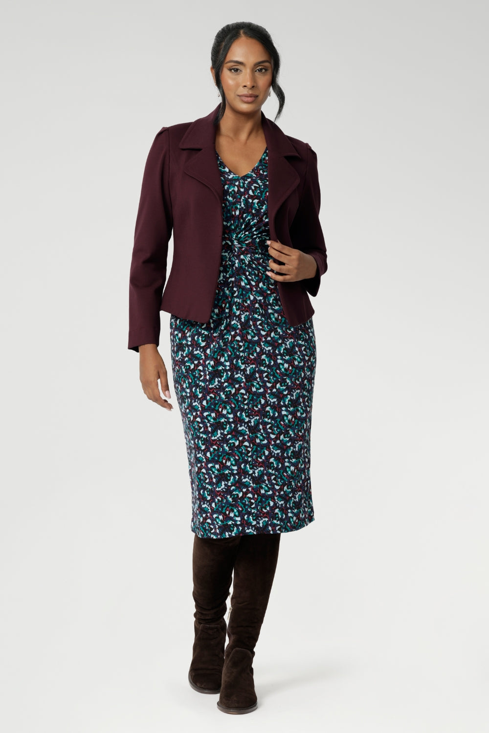 Pair it with a tailored jacket like Garcia for a polished workday look, or layer it under a trench or longline knit on cooler days. Its simple pull-on design and easy-care fabric make it an ideal piece for travel, busy mornings, or anytime dressing well needs to be uncomplicated. Overs 30's model wears the Kadence Dress with her Burgundy Garcia Jacket over the top & with long suede boots.