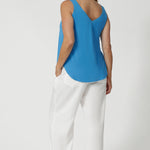 Woman's summer cami features a graceful V-neckline both in the front and the back, adding a touch of sophistication and subtle femininity to the overall look. Summer ready top is available in sizes 8-24. Fashion brand Leina & Fluer proudly stock petite and plus sizes. 