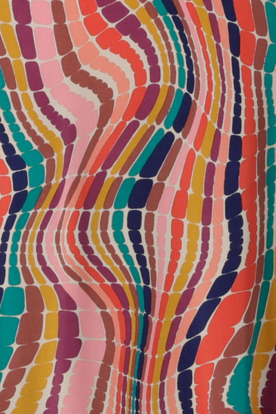 Close up of rainbow slinky jersey Made in Australia material. 