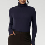 Introducing the Kean high turtleneck top from the Light Layers collection, a stylish and functional piece designed to elevate your wardrobe as the seasons cool. 
