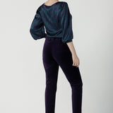 Back view of the Keaton Pant in Purple Velveteen is a slim fit pant with purple velveteen. Made in Australia for women. Cocktail pant suit set. Made in Australia for women size 8 - 24.