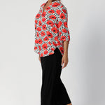 Although the fabric has no stretch, its exceptional drape creates a flattering silhouette that moves with you. Size 12 woman wears V-neckline top with a tailored tuck at the centre front, which adds subtle structure while maintaining the relaxed vibe of the top. The small collar stand with a luxe cross-over detail at the back neckline brings a refined, elegant touch to the design.