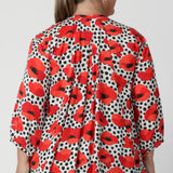 Australian-made and available in sizes 8-24, this top is crafted with care by Leina & Fleur, offering both style and comfort with a design that works for the office or casual weekend outings. The combination of effortless draping, beautiful print, and thoughtful details makes the Kelyn Swing Shirt a chic addition to any wardrobe.