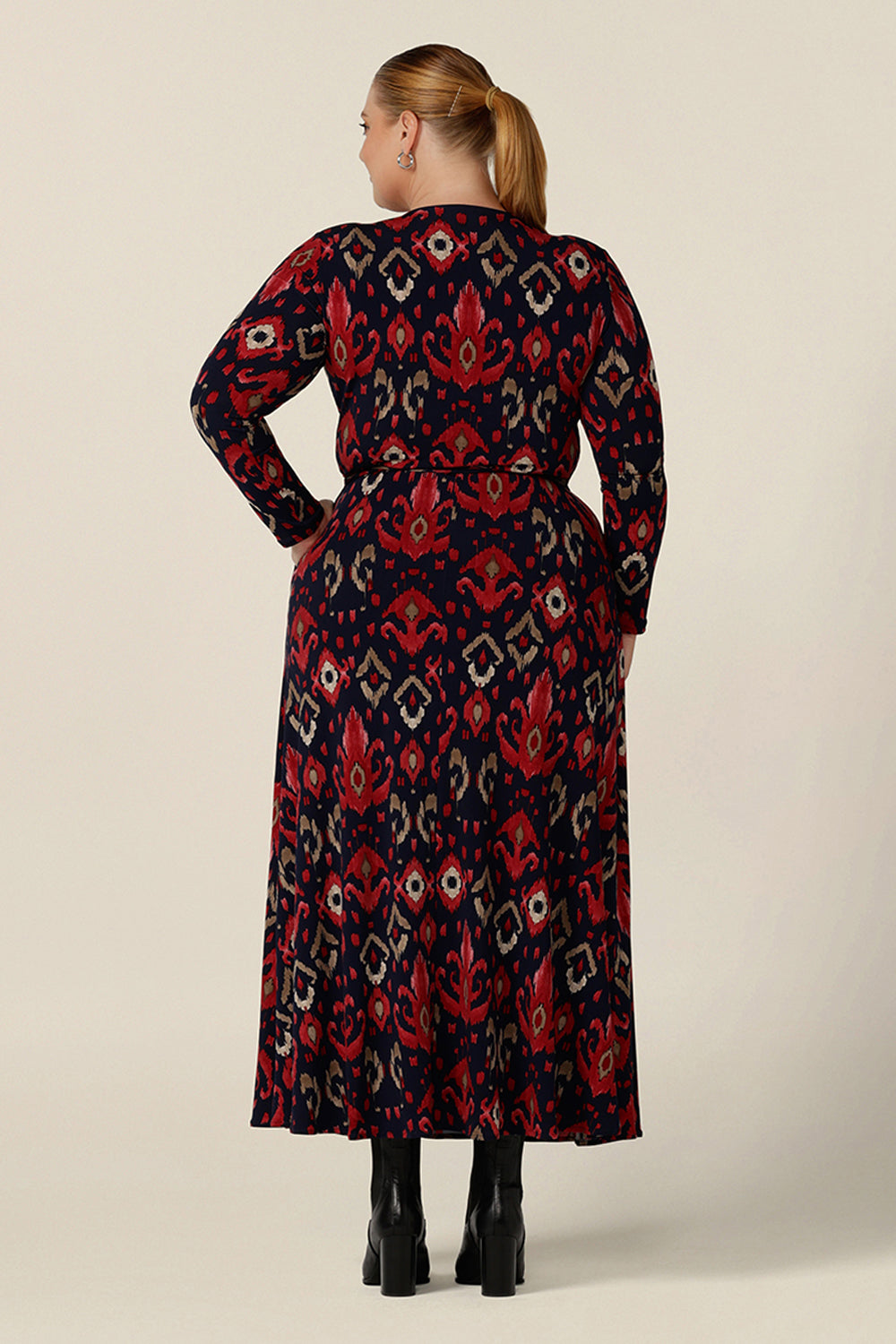 Back view of a great maxi dress for plus size women, the Kimberly Maxi Dress in Ikat is a full length jersey wrap dress with long sleeves. Shown on a size 18 woman, this maxi dress is made in Australia in sizes 8 to 24.