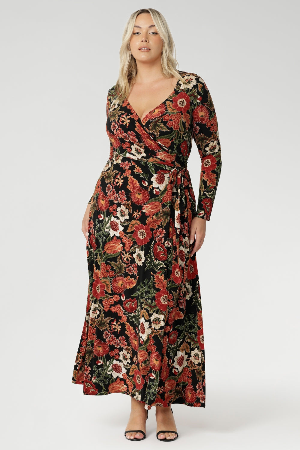 Tapestry print showcases a beautiful floral design in rich shades of red, orange, pink, beige, and green against a sleek black base. Designed with a double-layer back bodice for added structure, this dress provides a flattering silhouette and maximum comfort. Available in sizes 8 to 24, the Kimberley Maxi Dress is a versatile, inclusive piece that offers timeless style. 
