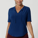 Our beloved Kodi Top is now available in a stunning Ocean colour, bringing a fresh, vibrant update to your workwear wardrobe. Crafted from a dry-touch jersey fabric with a soft stretch, the Kodi Top ensures full-body comfort, making it perfect for long days at the office or weekend outings. Available in size 8-24.