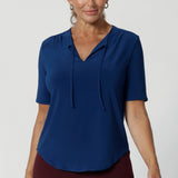 Our beloved Kodi Top is now available in a stunning Ocean colour, bringing a fresh, vibrant update to your workwear wardrobe. Crafted from a dry-touch jersey fabric with a soft stretch, the Kodi Top ensures full-body comfort, making it perfect for long days at the office or weekend outings. Available in size 8-24.