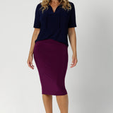 Available in two elegant colourways, this top also features neck ties that can be adjusted for different looks—either tied for a more tailored effect or left undone for a softer, flowing neckline. Made in Australia and available in sizes 8 to 24, this top is a versatile and stylish addition to any work wardrobe.