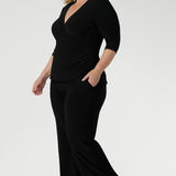 The Kyle Top is a versatile, timeless piece that transitions seamlessly from desk to dinner. It's the ideal combination of professional polish and all-day comfort, a must-have for any modern wardrobe. Available in sizes 8-24.