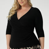This top features a fixed wrap bodice that stays in place, offering the elegance of a wrap design without the hassle of constant readjusting. Whether you're at the office or heading to an after-work event, the Kyle Top provides effortless style and confidence. 