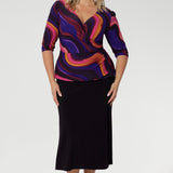 The Kyle Top in Jupiter is where bold print meets effortless polish. Featuring a vibrant, colourful swirly pattern inspired by planetary motion, this eye-catching design adds energy and personality to any professional wardrobe.