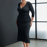 This versatile midi skirt is the perfect addition to any wardrobe, ideal for work, travel, or casual wear. Made from printed navy dry-touch fabric. Size 18 woman wears her Asher Skirt with matching Kyle Top in Midnight Mosaic for a sleek, feminine fit dress like style. Crafted from easy-care, wrinkle-resistant dry-touch jersey, this skirt is designed for all-day comfort and effortless styling.