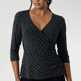 The double-layer back bodice adds extra structure, while the 3/4 length sleeves offer an elegant touch. The waist seam and soft peplum detail, which flows through both the front and back, add sophistication and can easily be tucked into high-waisted pants for a chic, versatile look. 