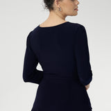 A fixed wrap top in Navy with 3/4 sleeves and a fixed wrap front. V-neckline top is the perfect corporate to casual top. Made in Australia for women size 8 - 24. 