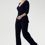 The Kyle Top is the perfect blend of professional polish and all-day comfort, making it a versatile addition to any modern wardrobe. Designed with a fixed wrap bodice that stays perfectly in place, this top offers the elegance of a wrap style without the need for constant adjustment. 