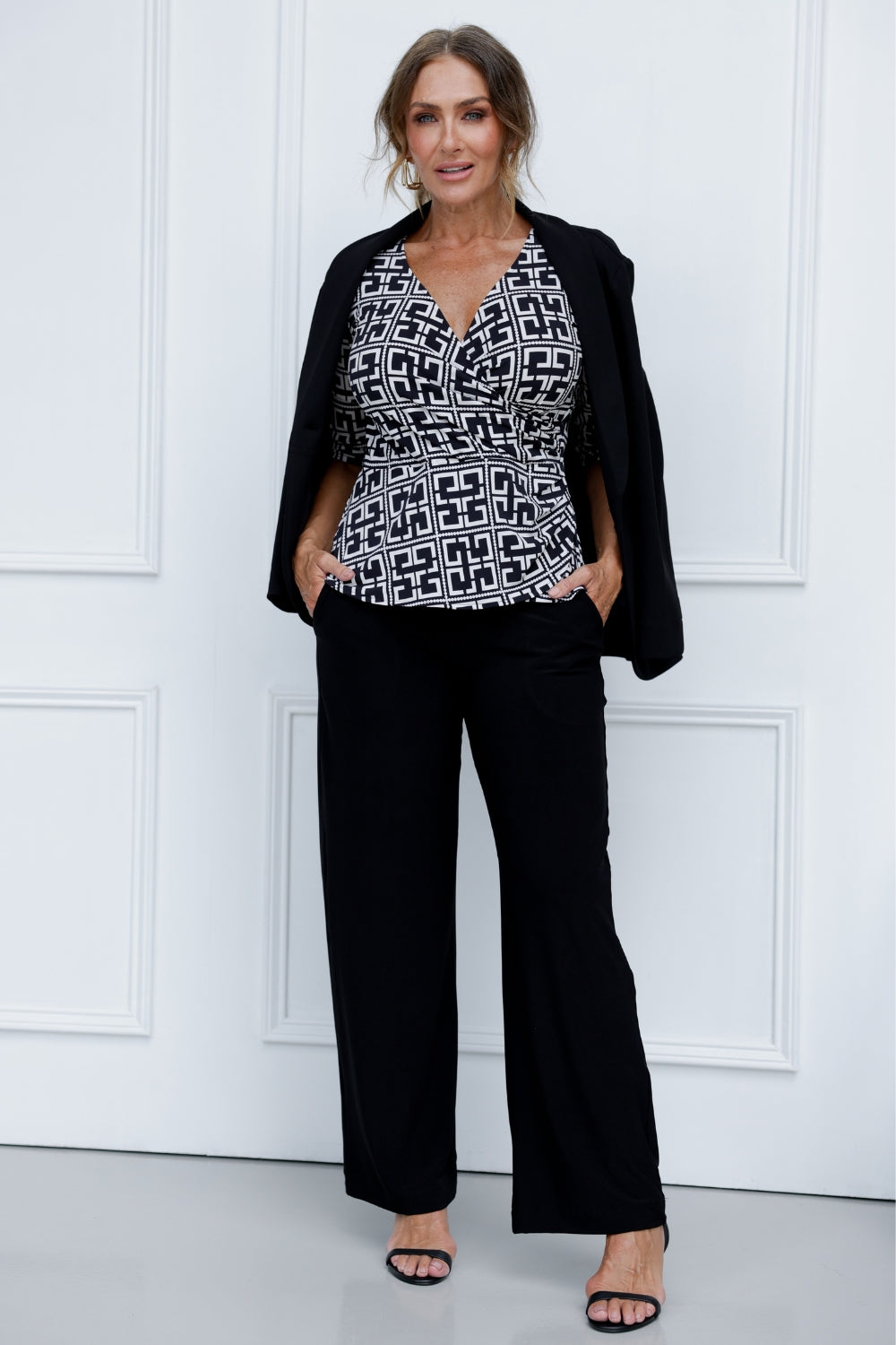 Available in two versatile colours and sizes 8-24, the Kyle Top is as comfortable as it is stylish, offering a great fit for all body types. Whether you pair it with a blazer for a polished office look or style it casually for the weekend. Women's wardrobe staple for any professional woman include the Kyle Top in Black & Olympia print. Available in sizes 8-24.