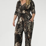 Plus size woman wears a leopard print faux jumpsuit made from the Kyle Top and the Monroe Pants in the newly released Panthera Print. All garments are available in sizes 8-24.