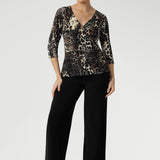 Whether you're at the office or heading to after-work events, the Kyle Top delivers effortless style and confidence. A double-layer back bodice ensures a smooth, secure fit, while ¾-length sleeves make it perfect for layering.