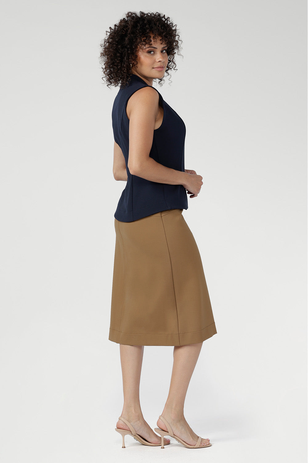 Designed to transition seamlessly through the seasons. The Landry Skirt pairs perfectly with the matching Zander Jacket for a modern take on polished suiting.