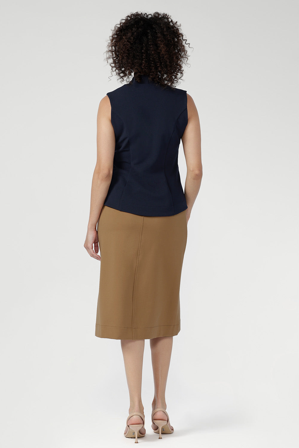 Designed to transition seamlessly through the seasons. The Landry Skirt pairs perfectly with the matching Zander Jacket for a modern take on polished suiting.