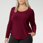 This flattering silhouette features subtle bust darts for shape, a clean round neckline with facing detail, and a refined back shoulder yoke with a centre-back pleat that adds gentle structure. Long fitted sleeves offer warmth without bulk, while the shirttail hemline creates a smooth finish that sits beautifully over the hips or can be easily tucked. Whether you’re layering up or wearing it on its own, the Leith Top in its rich Ruby hue brings both versatility and style to your everyday wardrobe.